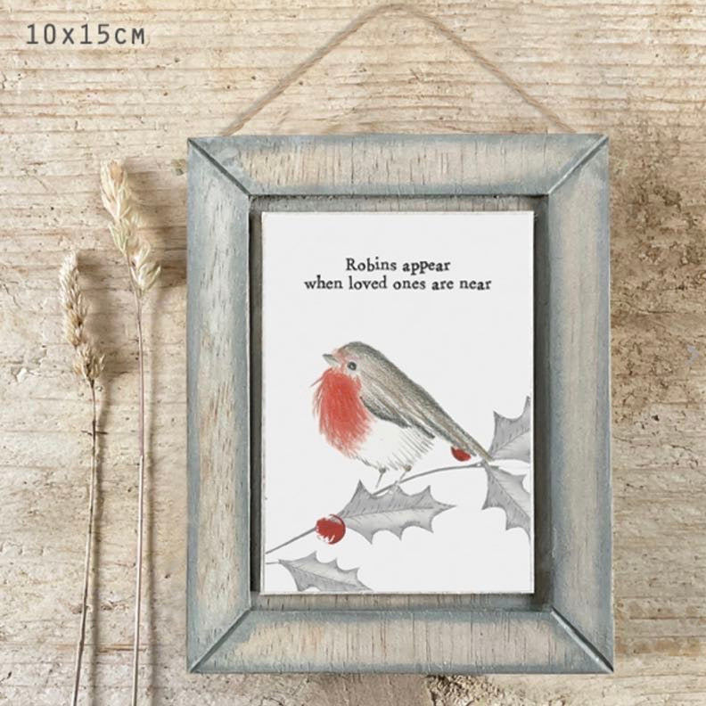 Robins appear when loved ones are near wooden hanging picture by east of India