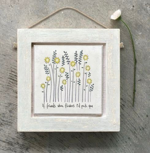 East of India small distressed whitewashed wooden framed picture with a wildflower and sunflower illustration and the sentiment "If friends were flowers I'd pick you," hung with natural jute twine string.