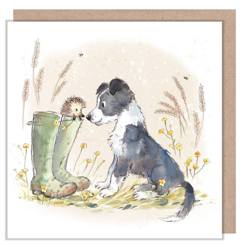 Blank inside watercolour greeting card with puppy and hedgehog beside green wellies, wildflowers and bees, with kraft envelope