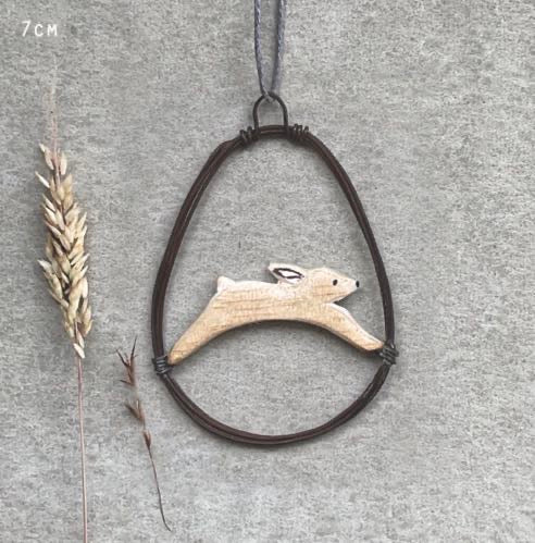 East of India wire egg hanging decoration with wooden running hare detail. A neutral spring/Easter ornament for branches, wreaths or Easter trees. Approx. 7cm.