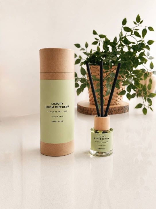 Rosy Roo luxury room reed diffuser in Coconut & Lime with gift tube packaging and black reeds