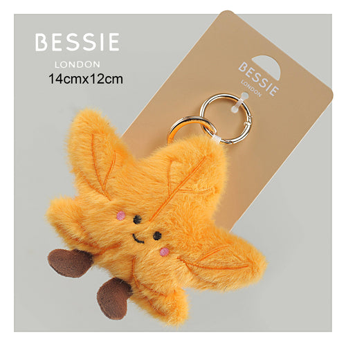 Bessie London leaf plush keyring bag charm with smiley face and fluffy orange leaf design (14cm x 12cm)