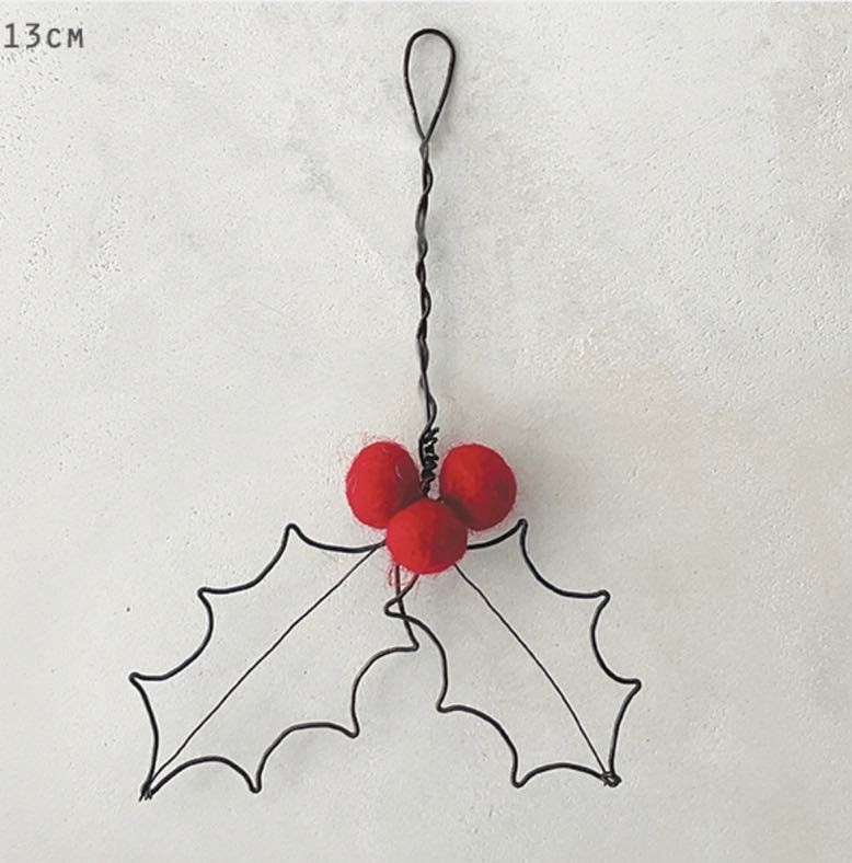 Rusty wire hanging red holly decoration from east of india