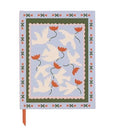 A Dopo Flower Journal hardcover notebook with doves and red poppies on blue background
