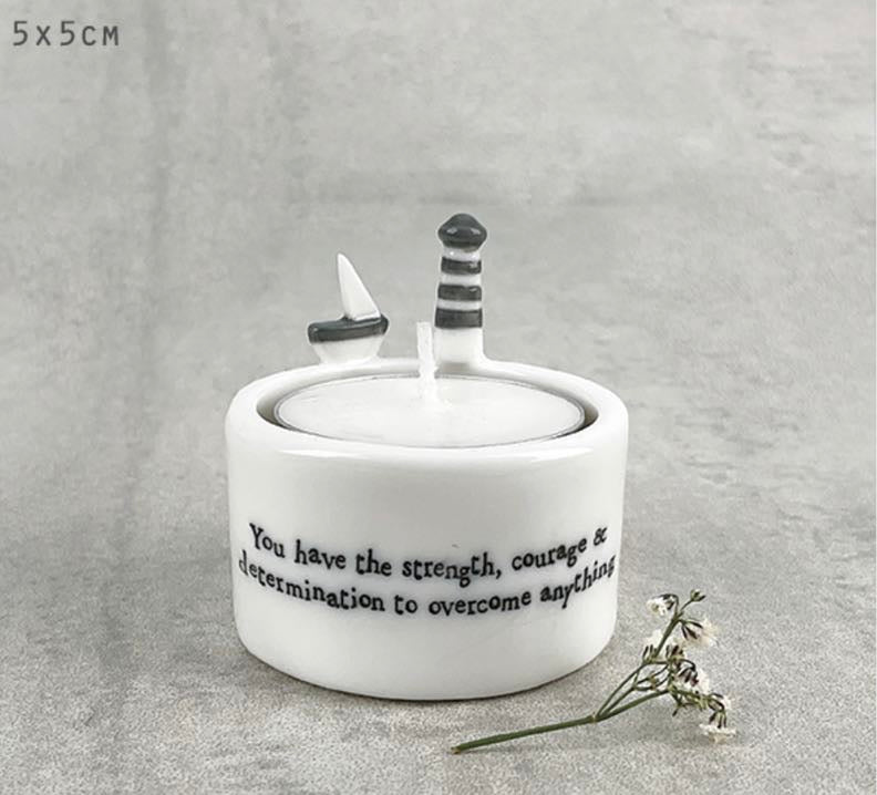 You have the strength, courage & determination to overcome anything’. tealight
