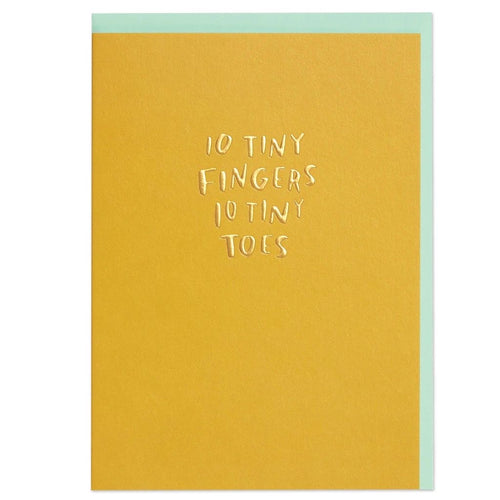 10 Tiny Fingers 10 Tiny Toes new baby card in mustard yellow with embossed lettering