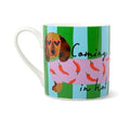 HiJiNX Coming in Hot ceramic mug with green and blue vertical stripes featuring an illustrated dachshund in a chilli pepper-print outfit and heart-shaped sunglasses, shown with its matching coral gift box.