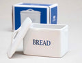 Cowfield Design mini white ceramic bread bin with lid and “BREAD” text