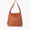 Front view of a Tan Pebbled Italian Leather Shoulder Bag with a slouchy hobo design and wide strap.