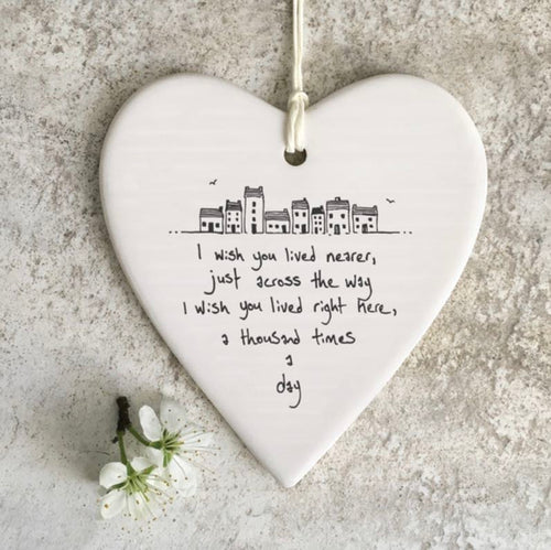 I wish you lived nearer, just across the way. I wish you lived right here, a thousand times a day' hanging heart
