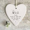 Friends are not our whole lives, but they make our lives whole' hanging heart