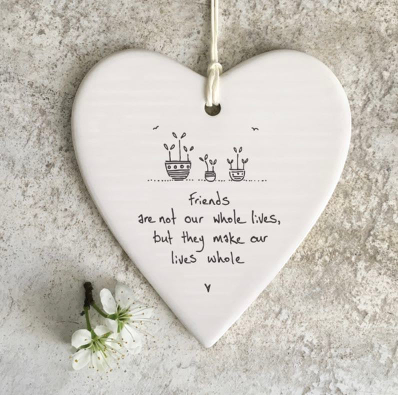 Friends are not our whole lives, but they make our lives whole' hanging heart