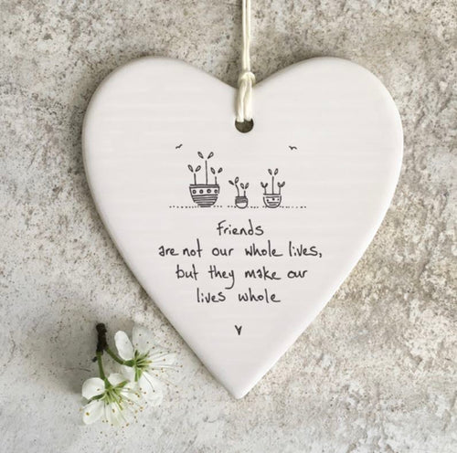 Friends are not our whole lives, but they make our lives whole' hanging heart