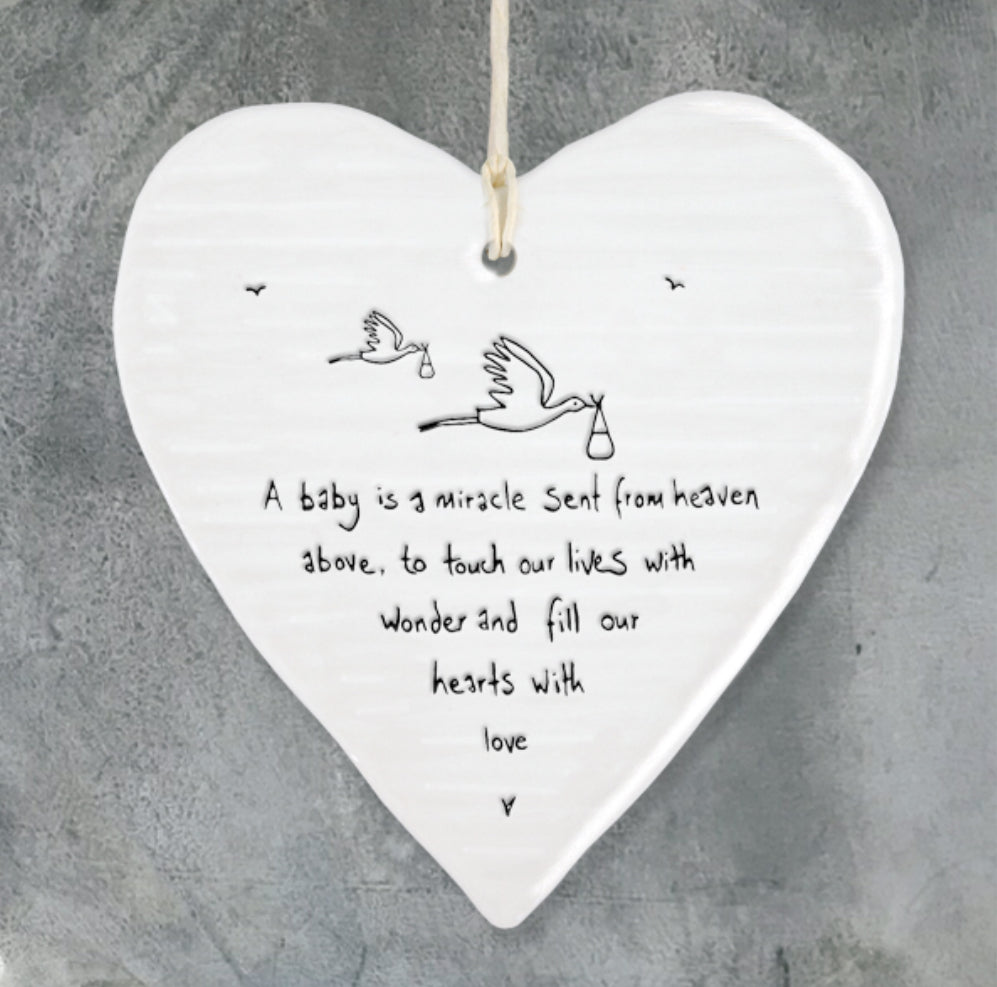 A baby is a miracle sent from heaven above, to touch our lives with wonder and fill our hearts with love hanging heart