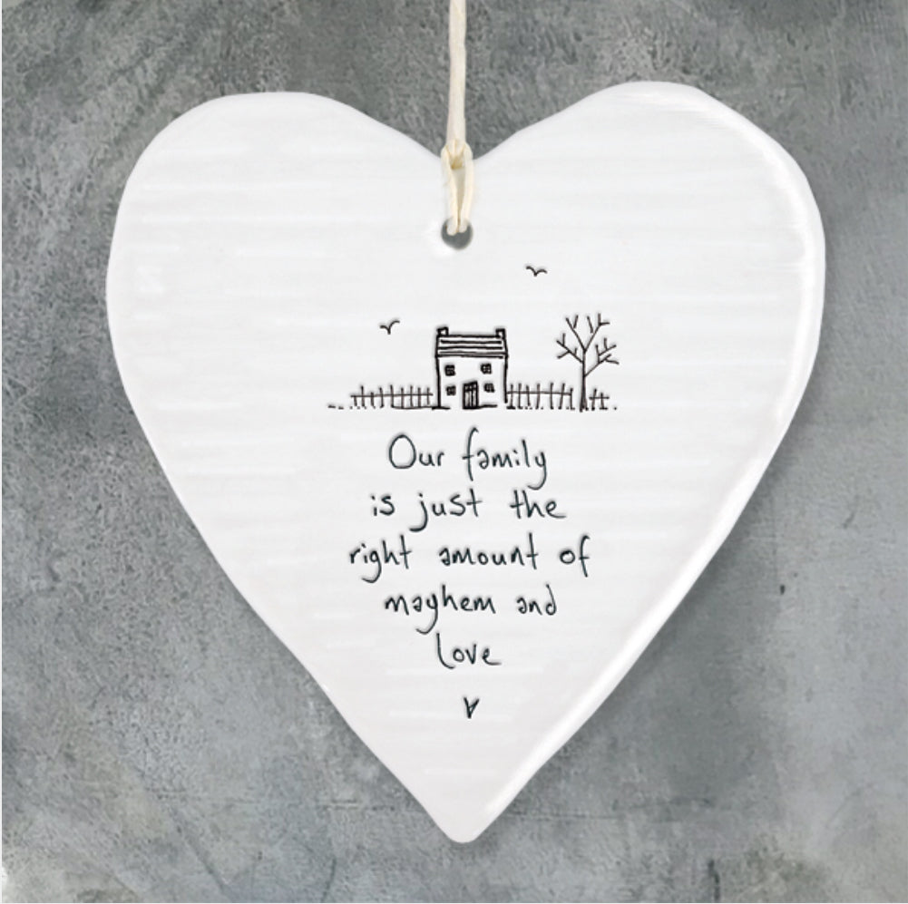 Our family is just the right amount of mayhem and love hanging heart