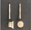 Washing up brush from east of india with wooden handle